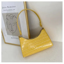 Load image into Gallery viewer, Yellow crocodile pattern PU leather women's shoulder bag displayed against framed artwork.