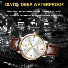 Cargar imagen en el visor de la galería, Luxury men's quartz watch with vegan leather strap on a wet surface, showcasing 30ATM water resistance features, including anti-fog.