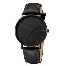 Cargar imagen en el visor de la galería, Black vegan leather luxury men's watch with minimalist design and stitched strap, featuring a sleek black dial.