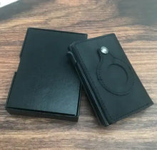 Load image into Gallery viewer, Minimal Leather Credit Card Holder with sleek design, shown on wooden surface, perfect for organizing essentials and streamlining your wallet.