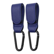 Cargar imagen en el visor de la galería, 1/2pcs PU leather stroller hooks in blue, featuring 360-degree rotation for attaching bags and essentials to a baby pram.