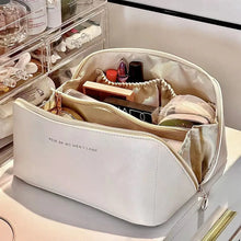 Cargar imagen en el visor de la galería, High-capacity leather cosmetic organizer with multiple compartments, featuring makeup and beauty products for a clutter-free vanity.