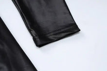 Load image into Gallery viewer, Close-up of Be So Faux Real Faux Leather Ruched Mini Dress sleeve featuring sleek black faux leather.