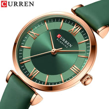 Cargar imagen en el visor de la galería, Curren green leather wristwatch with rose gold accents and classic clockface design, featuring roman numerals and quartz movement.