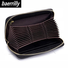 Cargar imagen en el visor de la galería, Black leather travel purse with multiple compartments, perfect for organizing essentials, featuring a zip closure by Baerrilly.