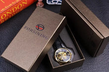 Load image into Gallery viewer, Men’s luxury watch in elegant packaging, featuring gold detailing and precision craftsmanship, perfect for adding sophistication to any outfit.