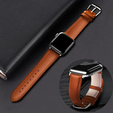 Cargar imagen en el visor de la galería, Brown leather band for Apple Watch, compatible with Series 1-5, shown on black background, highlighting its elegance and design.