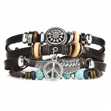 Charger l'image dans la galerie, Multilayer leather bracelet with charms and beads, featuring a peace sign, wing, and tribal designs, perfect for stylish accessory lovers.