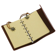 Cargar imagen en el visor de la galería, Anchor-Faux Leather Notebook open with nautical charms, showcasing elegant pages for capturing ideas and dreams.