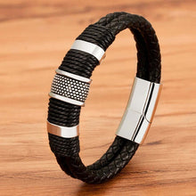 Cargar imagen en el visor de la galería, XQNI men's double layer leather bracelet with stainless steel closure on wooden background