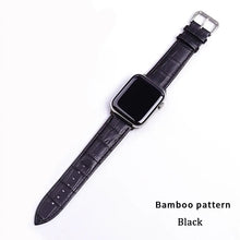 Cargar imagen en el visor de la galería, Black bamboo pattern leather band for Apple Watch showcasing elegant design, compatible with all series and sizes.
