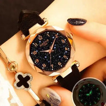 Cargar imagen en el visor de la galería, Premium vegan leather star sky watch with celestial dial, worn on wrist, showcasing luxury and elegance.