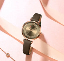 Cargar imagen en el visor de la galería, Elegant Classic Clock Leather Watch with a leather strap and quartz movement, ideal for women's fashion outfits, casual or formal.