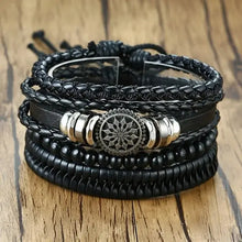 Cargar imagen en el visor de la galería, Vnox 4-piece vegan leather braided wrap bracelets with zinc alloy accents on wood surface.
