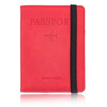 Cargar imagen en el visor de la galería, Red leather RFID-blocking passport holder and travel wallet with elastic strap for secure and stylish travel protection.