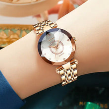 Cargar imagen en el visor de la galería, Elegant women's quartz watch with stainless steel band, scratch-resistant dial, and water-resistant design for style and durability.