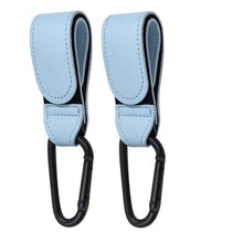 Cargar imagen en el visor de la galería, PU Leather Baby Stroller Hooks in blue with black carabiner, perfect for attaching bags and essentials to prams, offering 360-degree rotation.