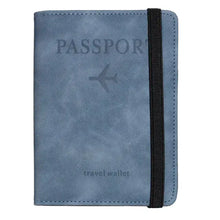 Cargar imagen en el visor de la galería, Leather RFID-blocking passport holder and travel wallet in blue with black strap for secure travel protection.