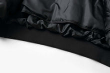 Load image into Gallery viewer, Close-up of REED Men's Premium Leather Aviator Bomber Jacket's interior lining and knit cuffs, showcasing durable construction.
