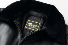Load image into Gallery viewer, Close-up of REED Men's Premium Leather Aviator Bomber Jacket's collar and label, showcasing its durable imported leather construction.
