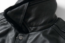 Load image into Gallery viewer, Close-up of REED Men's Premium Leather Aviator Bomber Jacket highlighting the soft, durable imported leather and classic style.