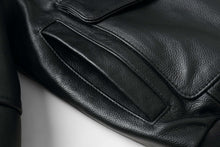 Load image into Gallery viewer, Close-up of REED Men's leather aviator bomber jacket pocket showcasing durable, premium soft leather craftsmanship.