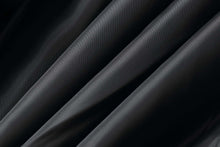 Load image into Gallery viewer, Close-up of luxurious black fabric texture for designer clothing