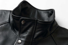 Load image into Gallery viewer, Close-up of REED 34'' Raglan Leather Car Coat in Imported Lamb with snap buttons and zip-out lining for classic and modern style.