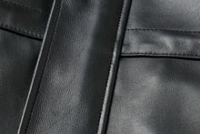 Load image into Gallery viewer, Close-up of REED's classic men's car coat in imported lamb leather with zip-out lining, showing premium design and smooth texture.