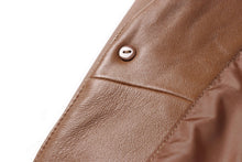 Cargar imagen en el visor de la galería, Close-up of REED men's lambskin leather blazer showing button detail and fine stitching.