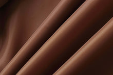 Cargar imagen en el visor de la galería, Close-up of smooth brown lambskin leather texture, showcasing its premium quality and luxurious feel.