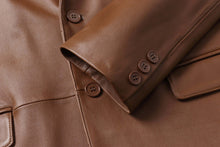 Cargar imagen en el visor de la galería, Close-up of REED Men's Premium Lambskin Leather Blazer showcasing soft-touch lambskin, buttons, and stitching details.