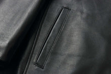 Load image into Gallery viewer, Close-up of the REED EST. 1950 Men's Jacket in black genuine lambskin leather with stitching detail.