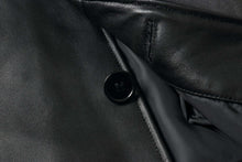 Load image into Gallery viewer, Close-up of REED EST. 1950 men's lambskin leather jacket showing button detail and soft lining.