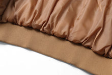 Load image into Gallery viewer, Close-up of the satin lining and hem of the REED Men's Baseball Suede Leather Jacket