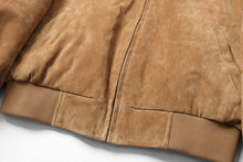 Load image into Gallery viewer, Close-up of REED men's suede leather baseball jacket, showcasing soft brown fabric, ribbed cuffs, and classic design.