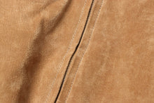 Load image into Gallery viewer, Close-up of soft suede leather on a REED Men's Baseball Jacket, highlighting texture and quality.
