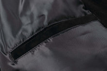 Load image into Gallery viewer, Close-up of REED Men's Baseball Suede Jacket's satin lining showing sleek black fabric and precise stitching.