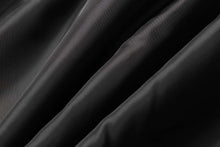 Cargar imagen en el visor de la galería, Smooth black fabric texture, close-up showing folds and luxurious sheen.
