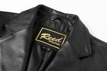 Cargar imagen en el visor de la galería, REED Men's Premium Lambskin Leather Blazer with label detail, showcasing soft-touch luxury in classic black design.