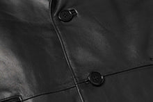 Cargar imagen en el visor de la galería, Close-up of REED Men's Lambskin Leather Blazer showcasing soft, durable leather texture and classic button design.