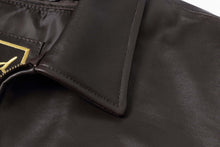 Cargar imagen en el visor de la galería, Close-up of REED Men's New Zealand lambskin leather jacket collar, showcasing soft-touch black leather material.