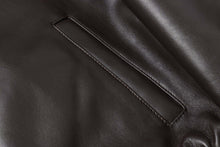 Cargar imagen en el visor de la galería, Close-up of REED Men's New Zealand lambskin leather jacket in black, showing the fine stitching and soft, smooth finish.