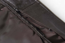 Cargar imagen en el visor de la galería, Close-up of the interior zipper and leather detailing on a REED Men's New Zealand Lambskin Leather Jacket in black.