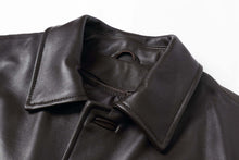 Load image into Gallery viewer, REED EST. 1950 men's genuine lambskin leather car coat with four button closure, close-up of collar detail.