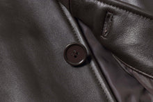 Load image into Gallery viewer, Close-up of a button and leather texture on the REED EST. 1950 Men's Genuine Lambskin Leather Jacket