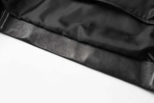 Cargar imagen en el visor de la galería, Black interior lining of REED Men's New Zealand Lambskin Leather Jacket showing fine craftsmanship and soft texture.