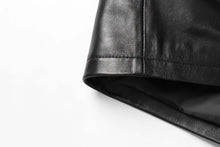 Load image into Gallery viewer, Close-up of REED genuine lambskin leather men's jacket showing premium quality and luxurious softness.
