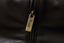 Load image into Gallery viewer, Close-up of Reed branding on zipper of men's lambskin leather jacket