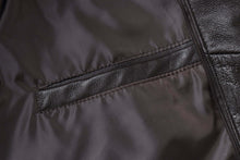 Load image into Gallery viewer, Close-up of REED Men's Jacket showing genuine lambskin leather detail and zip-up closure in the Winners Coat design.